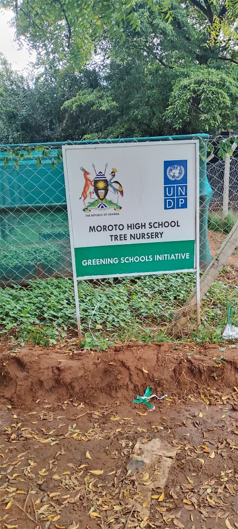 Moroto High School Tree Nursery — Greening Schools Initiative signage